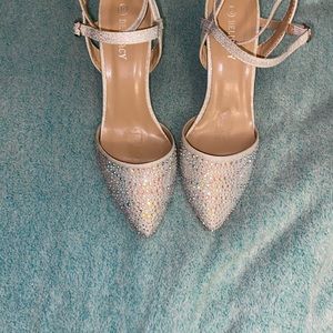 Strappy closed toe heels.